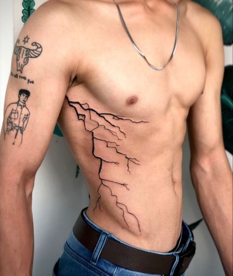 Men Lighting Tattoo, Cool Tats Men, Lightning Tattoo Side Rib, Lightning Bolt Tattoo Stomach, Men Lightning Tattoo, Lightning Tattoo On Ribs, Arm Tattoo Lightning, Lightning Bolt Tattoo Rib Cage, Lightning Side Tattoo