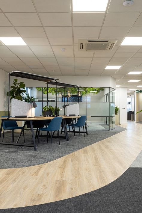 Our Moduleo 55 Woods, Blackjack Oak 220 LVT, Art Exposure and Rudiments carpet tiles were selected to transform this office space. Walkways were defined by mixing the finishes and texture between LVT and carpet, while a neutral palette provides a calming aesthetic. Use the link to request free samples to help with your next interior project. #office #flooring #fitout #interiordesign #architecture #commercialdesign Carpet Tiles Design, Office Flooring, Entrance Signage, Wood Walkway, Office Rooms, Flooring Texture, Calming Aesthetic, Innovation Center, Office Materials