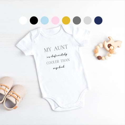 white onesie with a color swatch above it. the words my aunt is definitely cooler than my daddy written in black Auntie Baby Onesies, Auntie Onsies For Babies, Auntie Onesies, Funny Aunt Onesie, Auntie Onesie, Aunt Baby Clothes, I Love My Niece, Girl Onsies, Aunt Onesie