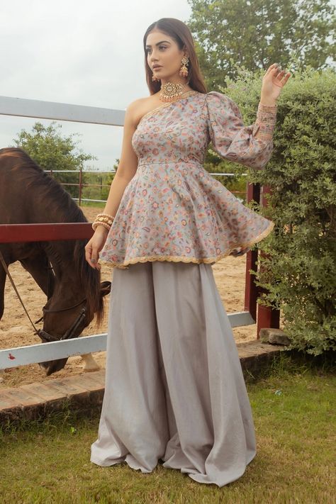 Safaa one shoulder peplum kurta and flared sharara set Off Shoulder Kurti, Flared Sharara, Kurta And Sharara Set, Kurta And Sharara, Kalamkari Dresses, Sharara Designs, Trendy Outfits Indian, Biology Lessons, Outfits Woman