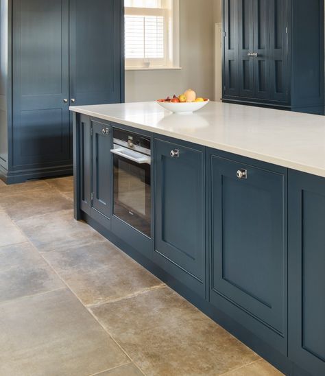 Petrol blue kitchen base cabinets with a white stone worktop. Petrol Blue Kitchen, Hague Blue Kitchen, Stone Kitchen Floor, Flagstone Floor, Kitchen Unit Designs, Blue Kitchen Designs, Utility Room Designs, Kitchen Cupboards Paint, Colourful Kitchen