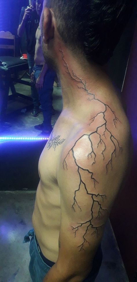 Lightning Bolt Tattoo Down Arm, Lighting Shoulder Tattoo Men, Lighting Tattoo Design Shoulder, Lightening Shoulder Tattoo, Lightning Bolt Tattoo Shoulder, Lighting Arm Tattoo, Thunder Tattoo Shoulder, Lighting Shoulder Tattoo, Lightning Neck Tattoo