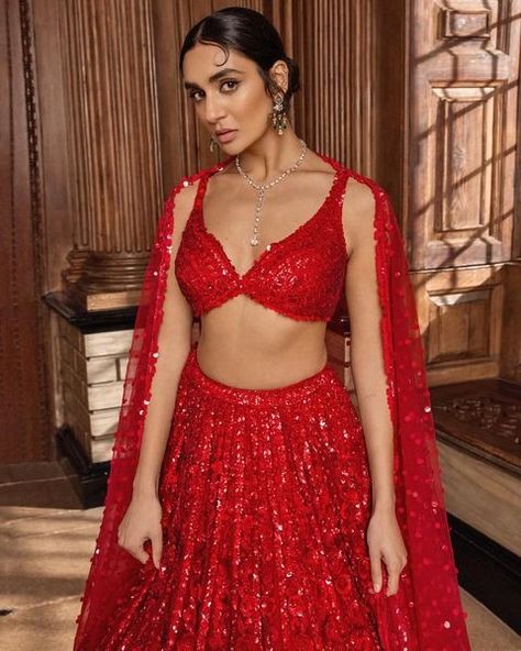 All posts • Instagram Gown Pattern Western, Pretty Lehengas, Red Lengha, Pakistani Attire, Blouse With Tassels, Strappy Blouse, Sequin Lehenga, Desi Vibes, A Royal Affair