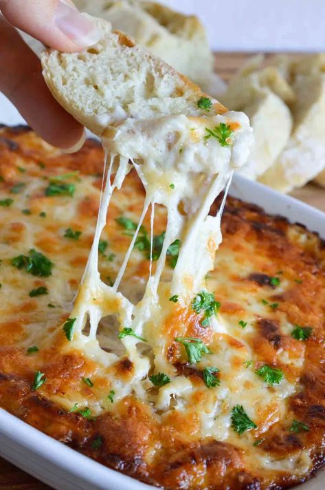 This Hot Cheesy Onion Dip Recipe is perfect for parties, holidays or game day! Melted cheese and caramelized onions in a creamy ooey-gooey dip. The best appetizer EVER! Appetizer Dips Hot, Hot Onion Dip, Warm Dip Recipes, French Onion Dip Recipe, Best Appetizers Ever, Dip Recipes Hot, Onion Dip Recipe, Dip Recipes Appetizers, Cheesy Dip