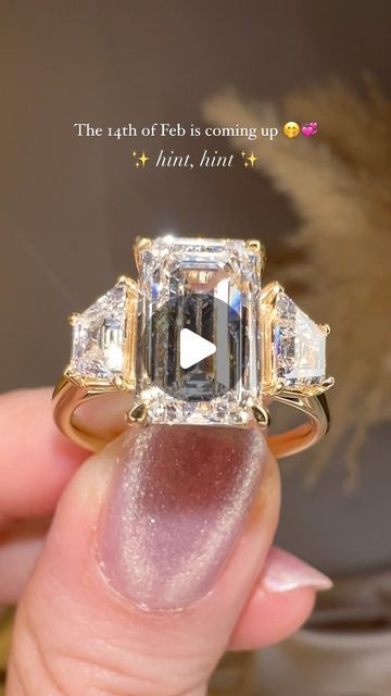 Heera Diamonds on Instagram: "Just a little gift inspo 🫶 The ring deets 👇

Trilogy 3 Stone
Emerald Cut
Lab Grown Diamonds
18 Gold
Excellent craftsmanship

💎 Let Heera Diamonds create your dream ring

💎 Natural & Eco-Lab Diamonds

💎 Heera Diamonds specialise in bespoke engagement rings & designer wedding bands

💎 Visit us by booking a FREE consultation with one of our jewellery experts! Link in our bio.

Hope to see you soon! 

💎 www.heeradiamonds.com 💎
📧 enquiry.heera@gmail.com
📞 +442037953782
 
Heera Fine Jewellery (Flagship) 
18 Hatton Garden, London. EC1N 8AT

Heera Diamonds,
25A Hatton Garden, London. EC1N 8BN.

Heera Bespoke,
95 Hatton Garden, London. EC1N 8NX.

Artisan Bespoke,
95 Hatton Garden, London. EC1N 8NX.

Heritage, 
95 Hatton Garden, London. EC1N 8NX.

#diamondring Hatton Garden Engagement Ring, Luxury Three-stone Green Diamond Ring, Fine Jewelry Emerald Three-stone Diamond Ring, Luxury Green Three-stone Diamond Ring, Green Tourmaline Ring With Halo Setting, Wedding Band Designs, Bespoke Engagement Ring, Gift Inspo, Dream Ring