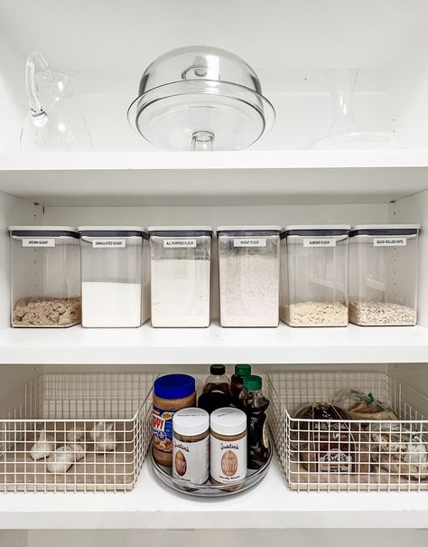 These two photos are showing pantry organization for baking supplies. The first photo has containers on shelves that have different types of baking supplies (like flour and sugar) inside of them, and two mesh baskets on a lower shelf with more supplies inside. The second photo has all of the same containers but they are empty. Oxo Pop Containers Pantry, Oxo Pop Containers, Organized Pantry, Product Placement, The Container Store, Pantry Door, Baking Set, Pantry Design, Container Store