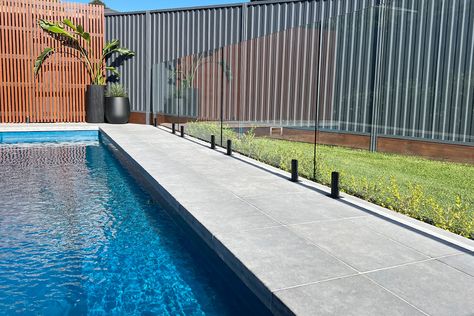 if you need any additional help with selecting pool coping and pavers for your fibreglass pool that will match your lifestyle needs call us on 1300 560 560 or visit our beautiful showroom in Glebe, Sydney. Fibreglass Pool Coping Tiles, Pool Coping Tiles, Fibreglass Pool, Coping Tiles, Pool Paving, Pool Pavers, Epoxy Grout, Limestone Pavers, Outdoor Pavers