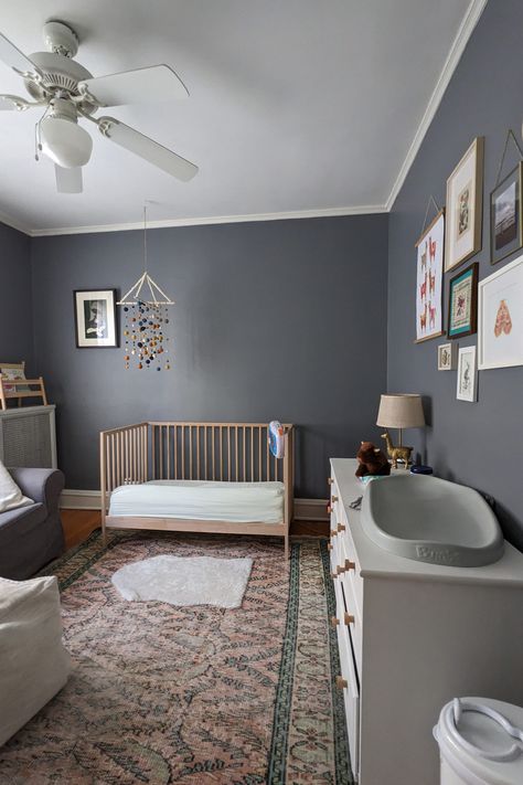 Dana and Andy first fell in love with this condo's vintage charm, and have appreciated all the work they did to make the space a comfortable home for their family, which now includes a young son. "Our condo has been a wonderful, cozy refuge," Dana writes. Nursery With Gray Walls, Gray Walls Nursery, Grey Walls Nursery, Grey Wall Nursery, Nursery With Gray Crib, Nursery Grey Walls, Long White Dresser, Dark Grey Nursery, Gray Nursery Ideas