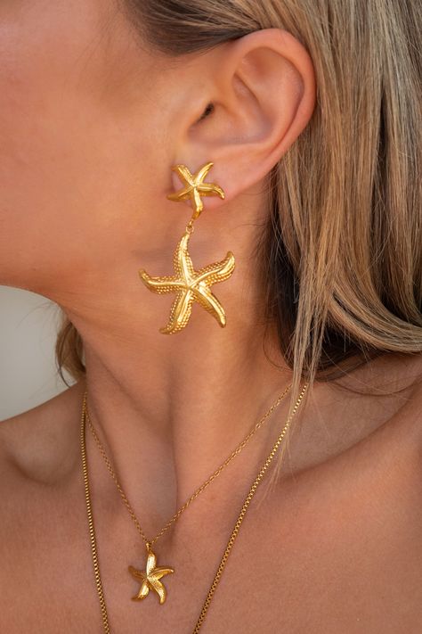 Details Gold Double Starfish Drop Earrings Length of Earrings: approx. 2.25 inches 18K Gold Plated Stainless Steel Starfish Jewelry, Formal Jewelry, Starfish Earrings, Womens Rings Fashion, Starfish Necklace, Ruby Necklace, Themed Jewelry, Trendy Earrings, Fancy Jewelry