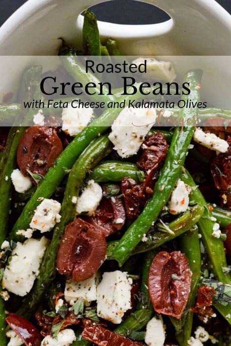 Fresh Green Beans roasted in the oven and combined with Feta, Sun-dried Tomatoes, and Kalamata Olives. This elegant side dish is perfect for your Easter Dinner. The flavors are magnificent. #greenbeans #roastedgreenbeans #sidedish Green Beans Roasted, Dinner Party Entrees, Oven Roasted Green Beans, Olive Recipes, Sundried Tomatoes, Vegetables Recipes, Roasted Green Beans, Green Beans And Tomatoes, Healthier Recipes