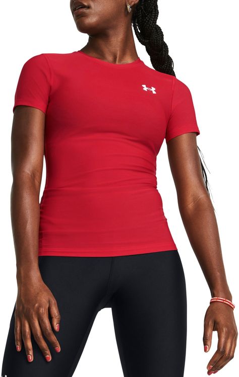 This season, UA is bringing back the very first version of HeatGear® they ever made—thicker, more compressive, and ultra-cooling—because athletes were demanding it. Fit & Design: Compression: Ultra-tight, second-skin fit The original, thicker HeatGear® fabric helps keeps you protected under your gear—limiting pinching, snagging & chafing Material wicks sweat & dries really fast 4-way stretch material moves better in every direction Ergonomic flatlock seams deliver a comfortable, chafe-free fit L Athletic T Shirts, Compression Shirts Women Outfit, Compression Shirts Women, Track Fits, Athletics Track, Under Armour Outfits, Dancing Clothes, Masc Women, Compression Shirts