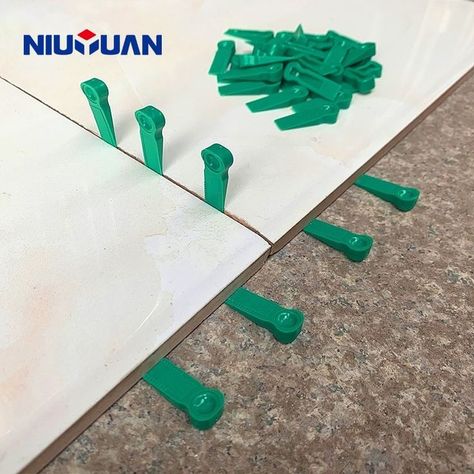 Tile Spacer Wedges (Niu Yuan Trims) Import from China, Competitive price and quality. Email: info@niuyuantrims.com We are selling wholesale. Tile Leveling System, Tile Spacers, Tiling Tools, Ceramic Floor Tile, Tile Accessories, Tile Edge, Construction Tools, Electric Skateboard, Durable Flooring