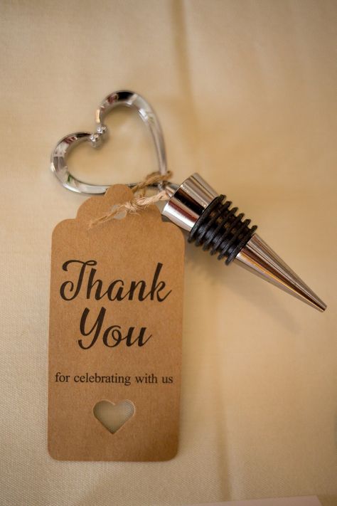 I was able to find these cute bottle stoppers on amazon as well as these thank you tags that came with twine. Most of the weddings I have been to usually do a bottle opener which are very handy. I always try to be a little different, and even after the wedding everyone is still raving about the idea and how much they love the stopper. #bottlestoppers #weddingfavors #weddingideas #springwedding #weddingdetails #weddingreception #receptionideas Wine Opener Wedding Favor, Wine Stopper Favors, Wine Stopper Wedding Favors, Bottle Opener Wedding Favors, Heel Stoppers, Influencer Event, Bridal Era, Pearl Bridal Shower, Wine Wedding Favors