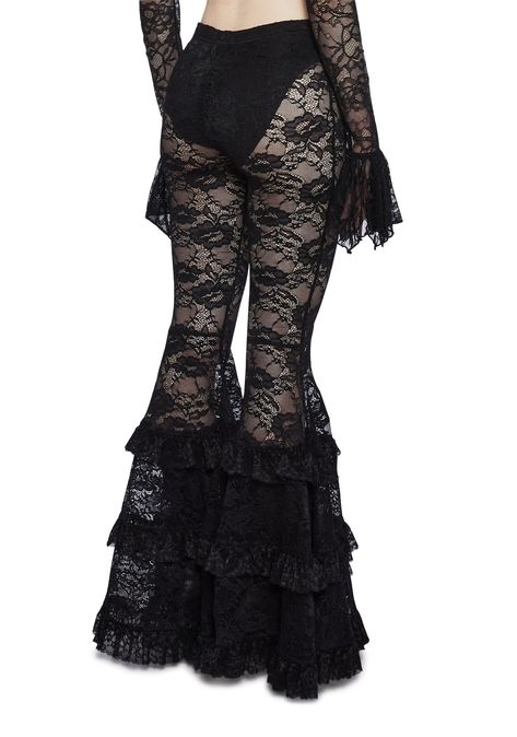 kiss me in the dark. These pants have a stretchy lace construction, flare pants with a layered ruffled bottom, and a built-in panty. Pants With Tassels, Gothic Clothing Ideas, Whimsigoth Pants, Layered Tights, Goth Bottoms, Lace Bell Bottoms, Cute Outfits Black, Lace Flare Pants, Clothes Bottoms