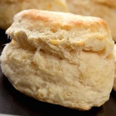 The BEST 3 Ingredient Buttermilk Biscuits Looking for quick and easy biscuit recipes? These flaky biscuits are made with just 3 simple ingredients and your entire family will love them. Serve them with breakfast, lunch or dinner! Servings 12 Ingredients 2 1/2 cups self-rising flour (Whitelily brand is best) 1 stick frozen butter (plus 2 tbsp melted for brushing) 1 cup cold buttermilk Instructions Preheat oven to 475 degrees. Line a baking sheet with parchment paper. Grate the frozen butter ... Best Buttermilk Biscuits, Homemade Biscuits Recipe, Easy Biscuit Recipe, Homemade Buttermilk Biscuits, Breakfast Sides, Cheddar Bay Biscuits, Flaky Biscuits, Cheddar Biscuits, Easy Butter