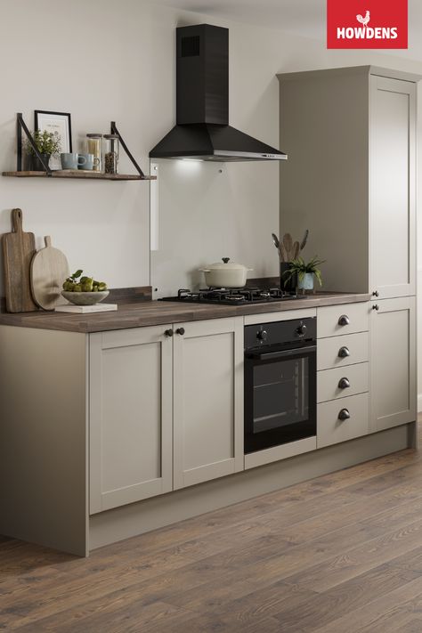 Looking for grey kitchen inspiration or shaker kitchen inspiration? Our Howdens Witney Pebble Kitchen is perfect for your grey kitchen ideas and traditional kitchen design. Add a dark oak worktop kitchen and dark oak flooring to your grey kitchen cabinets. Pair your shaker kitchen cabinets with a bespoke kitchen island ideas, an alternative to your seating area in kitchen. Stone Kitchen Cabinets Colour, Uk Small Kitchen Ideas, Dark Oak Floor Kitchen, Dark Worktop Kitchen Ideas, Pebble Colour Kitchen, Pebble Kitchen Cabinets, Cashmere Grey Kitchen, Dark Wood Worktop Kitchen, Stone Coloured Kitchen