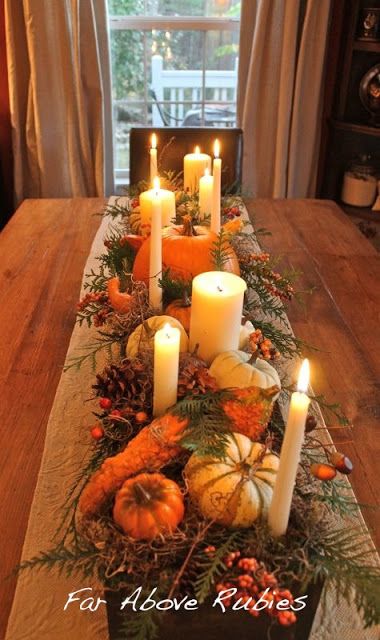 Evergreen sprigs and white candles of varying sizes are the backbone of this autumn tablescape. For an easy winter update,  remove the gourds and add pinecones, berries, and red fruit. Long Wood Box, Fall Deco, Autumn Decorating, Thanksgiving Centerpieces, Fabulous Fall, Deco Floral, Fall Centerpiece, Fall Table, Fall Holidays