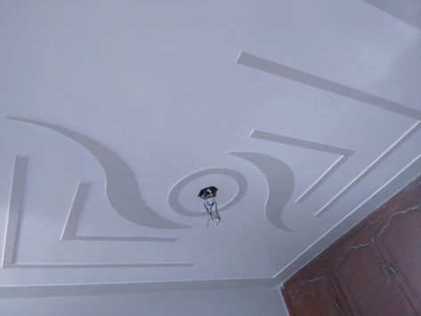 Roof Fan Box Pop Design, Plaster Ceiling Design Simple, Pop Roof Ceiling Design, Plus Minus Pop Design For Room, Modern Plus Minus Pop Design For Roof, Pop Desine, Minus Plus Pop Design, Plus Minus Pop Design, Wooden Cupboard Design