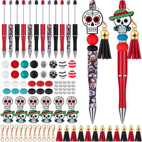 PRICES MAY VARY. Abundance of Creative Supplies: this package offers you a variety of 12 beaded pens bulk, 12 tassels, 12 dwarf decorations, 12 clasps, and 50 beads; With such a generous quantity, you'll have everything you need for your daily crafting projects Assortment of Beads: the beads for beadable pens in this set come in vibrant colors, featuring rhinestones and more; These charming and stylish beads will shine when exposed to light, allowing you to personalize your pens according to you Diy Pens, Bead Pens, Office Christmas Gifts, Beads Tassels, Beadable Pens, Pen Craft, Pen Diy, Skull Style, Beaded Pens