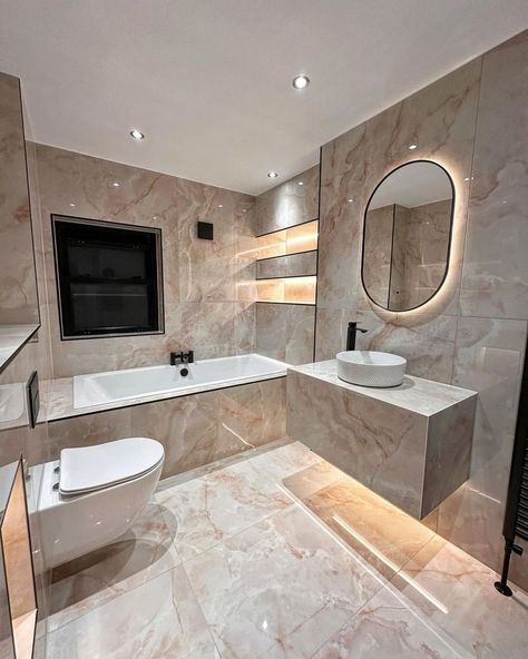 TB to 2023, when one of the nation's favourite geordies, Marnie Simpson, used our Peach Onyx for her bathroom renovation to create this stunning bathroom design 😍 With bold veining and a charmingly delicate pink shade, these luxurious Peach onyx effect tiles are truly magical and perfect for opulent schemes. See the full bathroom on our TikTok here -https://shorturl.at/T0356 #bathroomideas #2024interiortrend #interiorideas #modernluxury #bathroom #trendingbathroomdesign #marbletile #tile Marnie Simpson, Washroom Tiles, Peach Bathroom, Marble Bathroom Designs, Onyx Tile, Her Bathroom, Modern Bathroom Interior, Bathroom Design Trends, Washroom Design