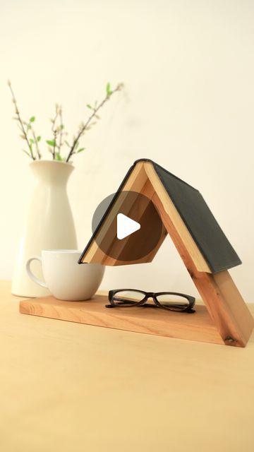 Woodshop Diaries | Shara on Instagram: "It’s the third day of DIY Gift Week and this one is for the bookworms on your list! 
This super easy book holder only takes a few minutes to put together and is a great inexpensive, but thoughtful gift. Pair it with a new book for a little something extra 🎁
For more gift ideas, check out what @housefulofhandmade and @anikasdiylife are sharing this week and head to woodshopdiaries.com for the details on this build and more! #diygiftideas #christmasgift #handmadegifts #diychristmasgifts #diybookholder" Diy Book Holder, Woodshop Diaries, Christmas Canvas Art, Cottage Decor Farmhouse, Easy Books, Woodworking Inspiration, Book Holder, Wooden Books, Woodworking Ideas Table