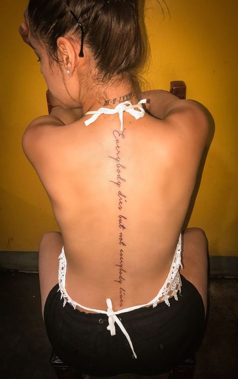 Baddie women’s feminine spine tattoos. Spine Tattoo Qoute, Spin Quote Tattoos, Tattoo Female Back Spine, Lyrics Down Spine Tattoo, Cursive Down Spine Tattoo, Womens Spine Tattoos Quote, Tattoos Going Down The Spine, Gorgeous Spine Tattoos, Spanish Quote Spine Tattoo