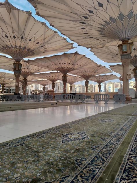 Medina, Saudi Arabia, 2022 - Umbrella construction on the square of Al-Masjid An-Nabawi or Prophet Muhammed Mosque are protecting people from sun at daytime and work as lights at night Nabawi Mosque, Masjid An Nabawi, Masjid Al Nabawi, Medina Saudi Arabia, Islamic Aesthetic, Al Masjid An Nabawi, Al Madinah, Lights At Night, Medina Mosque