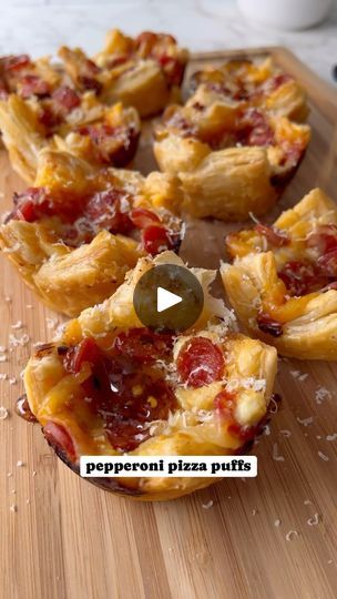 25K views · 4.9K reactions | Pepperoni pizza puff pastry cups 🍕

Crunchy, flaky and delicious puff pastry filled with homemade garlic butter, mozzarella, ricotta, pepperoni and topped with homemade hot honey 🤤 These would make a perfect app for Super Bowl! 🏈 Recipe below

1 sheet puff pastry, thawed
9 tsp Marinara or pizza sauce 
Shredded mozzarella cheese
9 tsp Ricotta cheese
Mini pepperoni cups
Parmesan cheese
Hot honey

Garlic butter
3 tbs softened butter 
1 garlic glove
1 tsp parsley 

Preheat oven to 375. Cut your puff pastry into 9 sheets. Spray a muffin tin with cooking spray and place one sheet in each tin. Make your garlic butter by combining butter, garlic and parsley. Brush the bottom of each puff pastry with garlic butter. Top with 1 tsp marinara sauce, pinch of shredded moz Pepperoni Cups, Pizza Puff Pastry, Homemade Hot Honey, Puff Pastry Cups, Pepperoni Pizza Puffs, Pastry Cups, Puff Pastry Pizza, Pastry Pizza, Homemade Garlic Butter