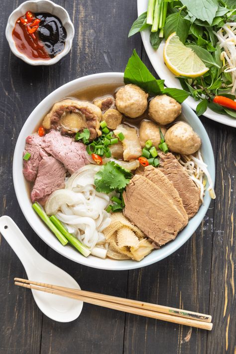 Learn how to make authentic Phở from scratch to serve with your favorite toppings and herbs - just like how it is from your favorite restaurant! #homemadepho #pho #vietnamesepho Authentic Pho Recipe, Home Made Pho, Vietnam Drawing, Vietnamese Pho Soup Recipe, Authentic Pho, Pho Vietnam, Pho Soup Recipe, Pho Spices, Vietnamese Beef