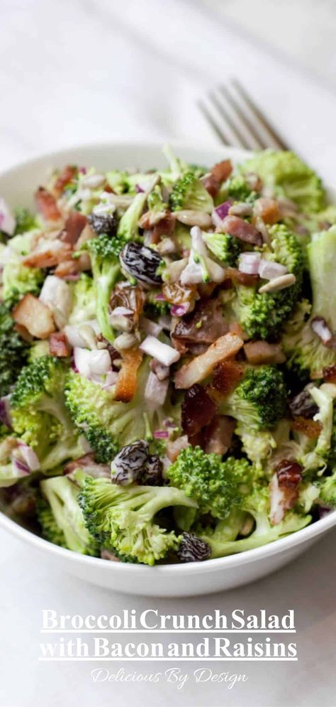 Enjoy the crunch of this raw broccoli salad punched up with bacon, onion, raisins, sesame seeds, and a tangy three ingredient dressing. Broccoli Salad With Grapes, Broccoli Crunch Salad, Raw Broccoli Salad, Crunchy Broccoli Salad, Raisin Salad, Crunchy Broccoli, Broccoli Crowns, Crunch Salad, Vegetable Appetizers