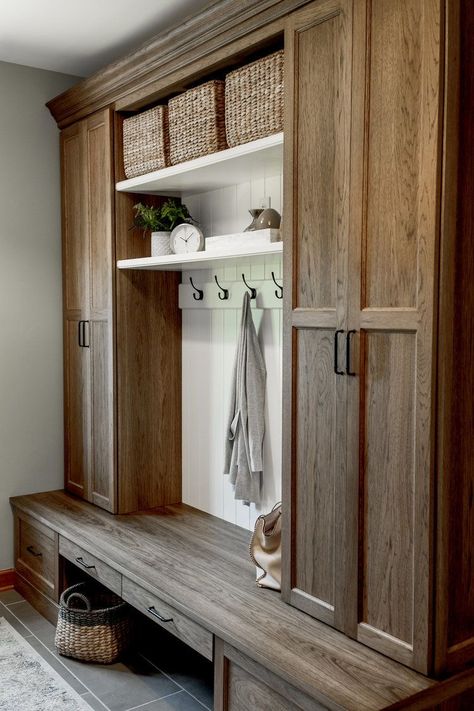 Closet And Bench Entryway, Mudroom Stained Cabinets, Natural Wood Mudroom Cabinets, Chic Mudroom Ideas, Open Floor Entryway, Pocket Closet Organization, Tall Mudroom Cabinet, Mudroom Tall Cabinets, Pantry In Mudroom