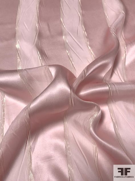 SKU: 9403 Content: Silk / Lurex Color: Pink / Gold Width: 43 inches This fabric is a last cut and no longer in production. Once sold out, we are unable to get more. Pink Silk Fabric For Wedding, Pink Poison, Blush Pink Bedroom Decor, Pink Metallic Fabric, Pale Pink Silk Pattern, Silk Fabric Gold, Pink Ribbon Mood Fabrics, Dress Fabrics, Pink Chiffon