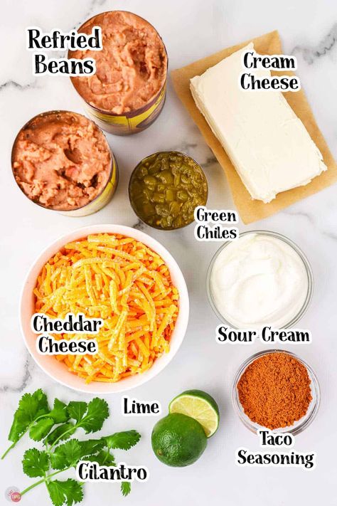 Taco Night Dip Ideas, Diy Fritos Bean Dip, Refried Bean Dip Crockpot, Championship Bean Dip, Spicy Bean Dip Recipes, Bean And Queso Dip, Cream Cheese Bean Dip Recipes, Nacho Bean Dip, Refried Black Bean Dip