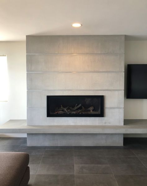 Beautiful, floating concrete hearth, fabricated with Naturecast Concrete in the Pacfic Northwest Fireplace Hearth Ideas, Gas Fireplace Ideas Living Rooms, Hearth Ideas, Fireplace Modern Design, Contemporary Fireplace Designs, Fireplace Feature Wall, Fireplace Designs, Linear Fireplace, Concrete Fireplace