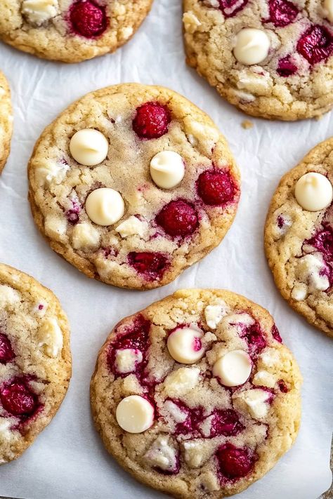 Featuring pops of vibrant fruit and rich, creamy chocolate, these white chocolate raspberry cookies are a delightful summer treat or year-round indulgence. White Chocolate Raspberry Cookies Recipe, White Chocolate Raspberry Pie, White Chocolate And Raspberry Cookies, White Chocolate Raspberry Cookies, Chocolate Raspberry Cookies, Raspberry White Chocolate Cookies, Raspberry Cookie Recipes, White Chocolate Macadamia Nut Cookies, Raspberry White Chocolate