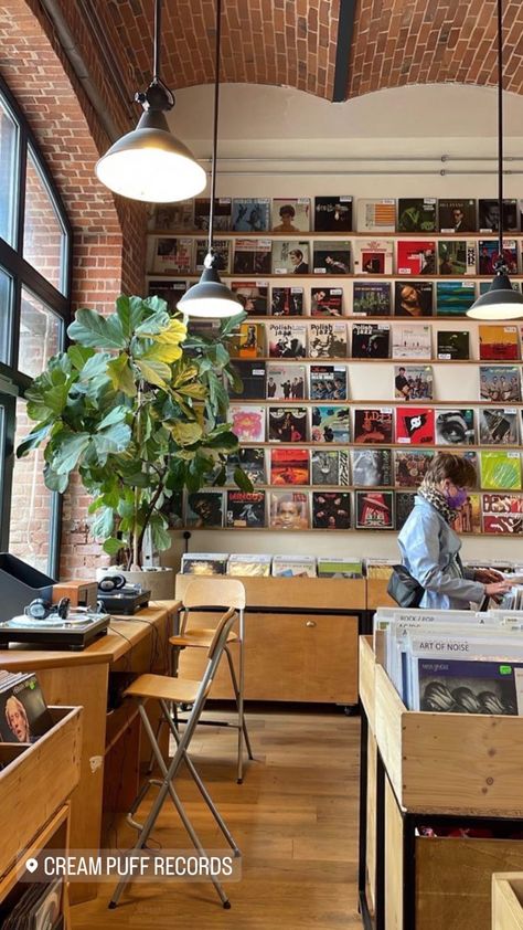 Vintage Music Store Aesthetic, Vinyl Records Coffee Shop, Industrial Interior Aesthetic, Record Shop Interior Design, Coffee Shop Room Aesthetic, Art And Coffee Shop, Book And Coffee Shop Aesthetic, Vinyl Cafe Design, Music Cafe Aesthetic