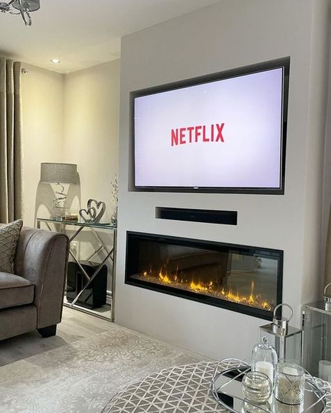 Dimplex North America on Instagram: "Wondering how to style your TV wall? The installation of an electric fireplace will add warmth and help you achieve a beautiful design. @our_ennerdale_home created a balanced and modern look by pairing their TV with an IgniteXL. Shop the IgniteXL through the link in our bio! #DimplexNA #DimplexIgniteXL #Dimplexinspo #Dimplexnafire" Electric Fireplace Tv Wall, Fireplace Walls, Tv Fireplace, Electric Fireplace With Mantel, Basement Decoration, Electric Fireplace Tv, Modern Tv Room, Electric Fireplace Wall, Fireplace Entertainment Center