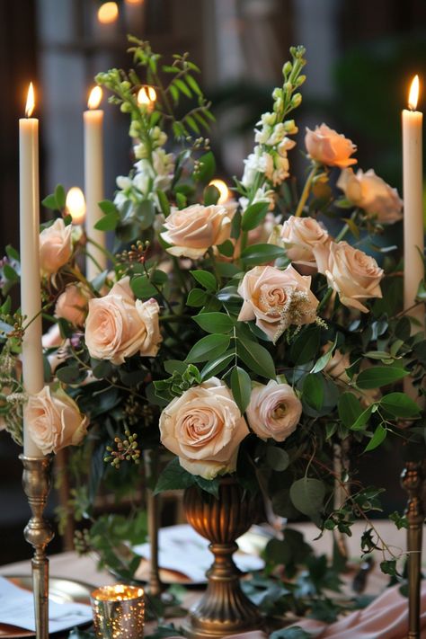 Create a romantic glow at your wedding with candle centerpieces. See more inspiration here. Elegant Succulent Centerpiece, Eucalyptus Candle Centerpiece, Silk Flower Centerpieces Wedding, Wedding Centerpieces With Candles, Beachy Centerpieces, Centerpieces With Candles, Branch Centerpieces Wedding, Romantic Centerpieces, Candlelit Wedding