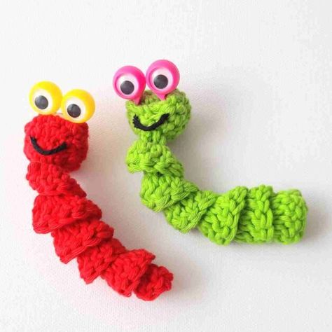 Create magical moments with this adorable "Worry Worm with Finger Puppet Eyes" crochet pattern. These little creatures will cast a spell of comfort and happiness on the hearts of kids who need it most. #CrochetMagic #WorryWormCrafts #CraftingForKids #startcrochet #crochetfingerpuppeteyes #crochetworryworms #fingerpuppeteyescrochetpattern #fingerpuppetgooglyeyescrochetpattern #crochetwithfingerpuppetgooglyeyes Worry Worm Crochet Pattern, Worm Crochet Pattern, Googly Eye Crafts, Start Crochet, Worry Worm, Crocheted Toys, Finger Puppet, Crochet Circles, Gift Toppers