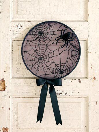 embroidery-hoop-spiderweb-wreath-f13197aa Spiderweb Wreath, Scary Halloween Yard, Spider Web Wreath, Black Halloween Wreath, Monster Wreath, Halloween Front Door Decorations, Halloween Decorations To Make, Halloween Diy Outdoor, Outdoor Halloween Decorations