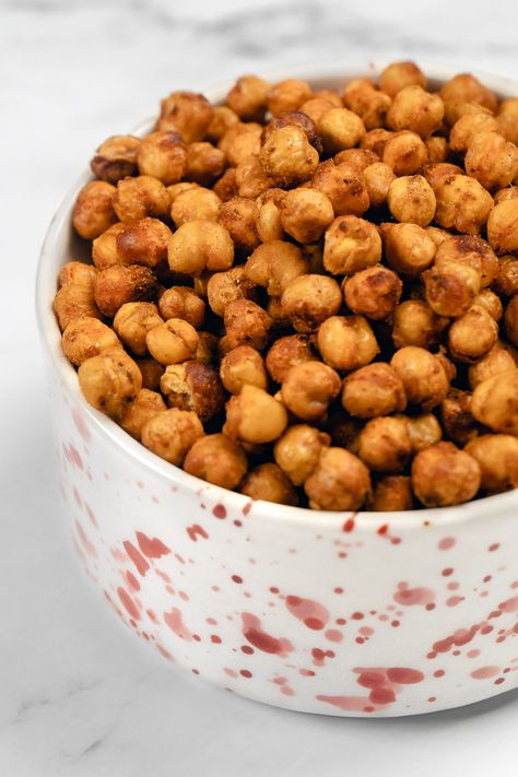 Enjoy a deliciously crispy and healthy snack with our Air Fryer Chickpeas made without oil! Packed with protein and flavor, these chickpeas are seasoned to perfection and easy to prepare, making them the perfect guilt-free treat for any time of day. Try this quick and nutritious recipe for a satisfying crunch! Air Fryer Chickpeas, Seasoned Chickpeas, Protein Rich Snacks, Guilt Free Snacks, Free Snacks, Canned Chickpeas, Time Of Day, Simple Recipe, Guilt Free