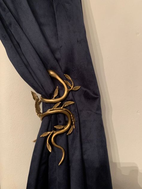 Hobbit Curtains, Anthropologie Curtain Tie Back, Goth Curtains Living Rooms, Snake Curtain Tie Back, Navy Holiday Decor, Witchy Curtain Ideas, Snake Interior Design, Moody Bedroom Window Treatments, Dark Moody Curtains