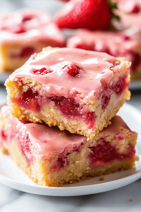 Strawberry Lemon Blondies are a delicious treat that beautifully balances the sweetness of strawberries with the zesty brightness of lemons. These soft, chewy bars are ideal for any occasion! Unlike cookies, bars and brownies are quicker to make and are the perfect dessert to bring to gatherings. This Strawberry Lemon Blondie recipe is bursting with Strawberry Cheesecake Blondies, Strawberry And Lemon Desserts, Strawberry Lemon Blondes, Mango Blondies, Strawberry Lemon Blondies Recipe, Strawberry Easy Dessert, Peach Blondies, Strawberry Lemon Brownies, Strawberry Jam Bars