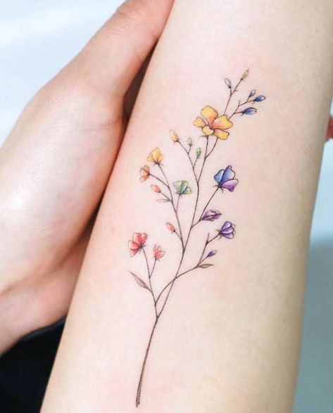 Small Colorful Flower Tattoos For Women, Coloured Wrist Tattoos For Women, Small Coloured Tattoos Simple, Rainbow Wildflower Tattoo, Small Rainbow Butterfly Tattoo, Rainbow Dandelion Tattoo, Half Colored Tattoo, Pride Flower Tattoo, Unique Tattoos Color