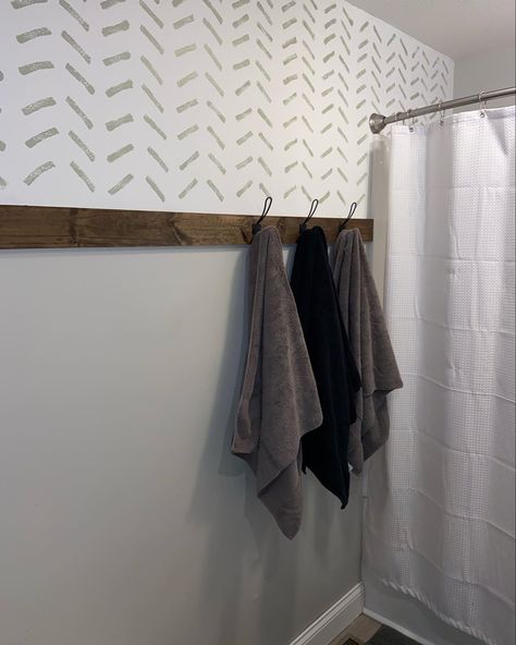 Fun Bathroom Accent Wall, Decorative Wall Bathroom, Bathroom Wall Makeover Diy, Bathroom Accent Wall With Hooks, Towel Wall Bathroom, Bathroom Accent Wall With Towel Hooks, Paint Accent Wall Bathroom, Easy Bathroom Accent Wall, Bathroom Focal Wall Ideas