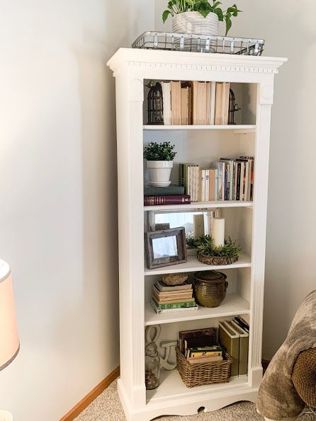 Dressing A Bookcase, White Bookcase Living Room, Lamp On Top Of Bookcase, Narrow Bookshelf Styling, Top Of Bookcase Decor, Bookshelf Decor Bedroom, How To Decorate A Bookcase, Tall Narrow Bookcase, Standing Bookshelf