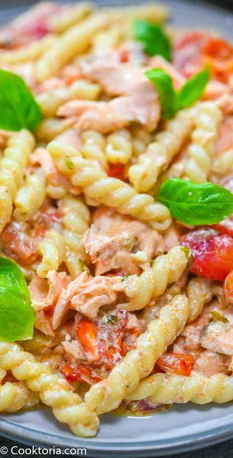 This Salmon Feta Pasta is so easy to make and is bursting with flavor. From the sweet cherry tomatoes to the baked feta, to the flaky salmon, this recipe is too delicious to miss. Healthy Korean Recipes, Salmon Noodles, Salmon Pasta Recipes, Grilled Portobello, Smoked Salmon Recipes, Cherry Tomato Pasta, Baked Feta, Salmon Pasta, Feta Pasta