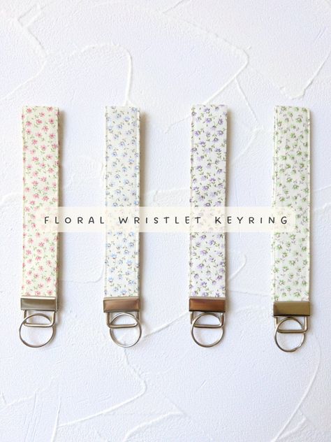 Floral Wristlet Key Ring 🌸  -100% Cotton -Each lanyard will come in a organza bag ready to gift to your loved ones or a little gift for yourself! 🫶🏻  Our wristlet lanyard will add a wonderful touch to your keys, keychains, bags and etc!  It will be easier to spot your keys and never loose your keys~  -Silver color hardware  (Key fob length)  6.5 in (length) (including the hardware)  1 in (wide)  -Each lanyard will be handmade and made to order Key Chain Wristlet, Wrist Lanyard For Keys, Cute Wristlet Keychains, Car Key Lanyard, Key Lanyard Aesthetic, Sew Keychain, Car Keys Keychain Ideas, Cute Keychains For Car Keys, Lanyard Aesthetic