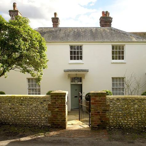 This Grade II‎-listed Georgian farmhouse in West Sussex features a hallway, sitting room, dining room, kitchen, drawing room, family room, utility room, boot room, five bedrooms and three bathrooms. Farmhouse Cottage Exterior, Georgian Farmhouse, Farmhouse Exterior Colors, White Farmhouse Exterior, 25 Beautiful Homes, Exterior House Siding, Cottage Front Doors, Cottage Exterior, Porch Steps