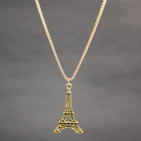 Capture the romance of Paris with our exquisite Eiffel Tower necklace, a timeless symbol of love and elegance.✨ .. . . . #EiffelTowerNecklace #ParisianChic #RomanticJewellery #SymbolOfLove #FashionEssentials #StatementPiece #JewelleryAddict #ElegantDesigns #FrenchStyle #ChicAndStylish Eiffel Tower Necklace, Romantic Jewellery, Parisian Chic, Love Symbols, Fashion Essentials, Statement Pieces, Elegant Design, Eiffel Tower, Romance